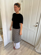 Strik med flagermuseærmer